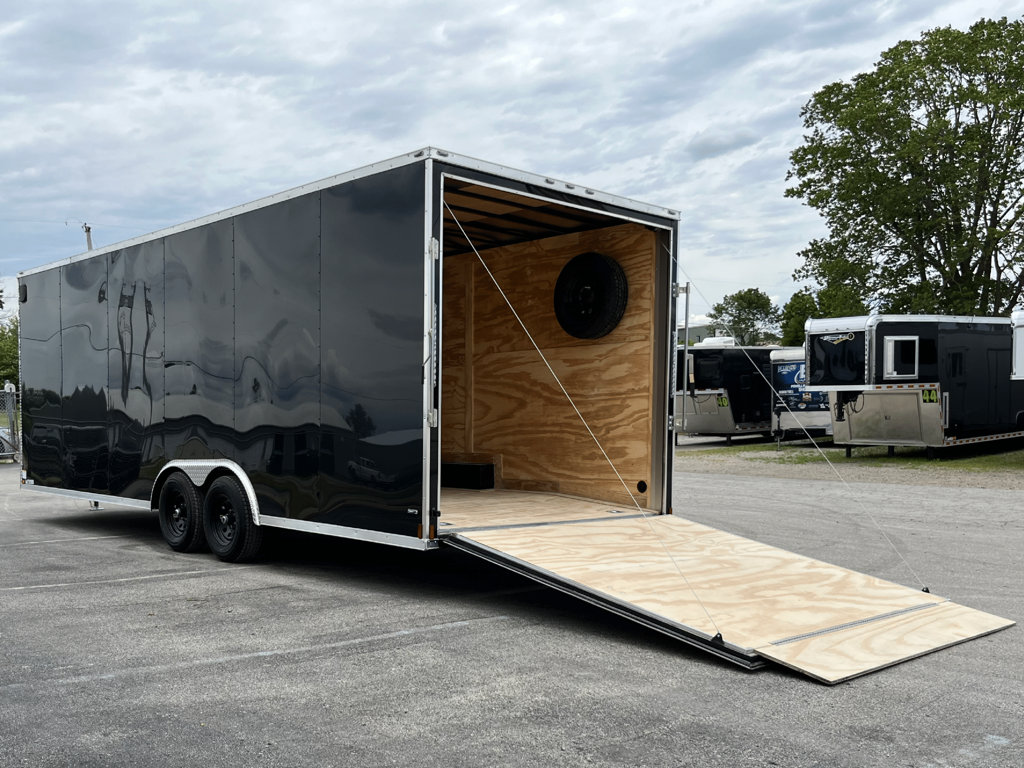 Enclosed Car Trailer 2026 24ft. New Econo-Max w/12in. Extra Height & .080 Poly-Core Ext. 1140